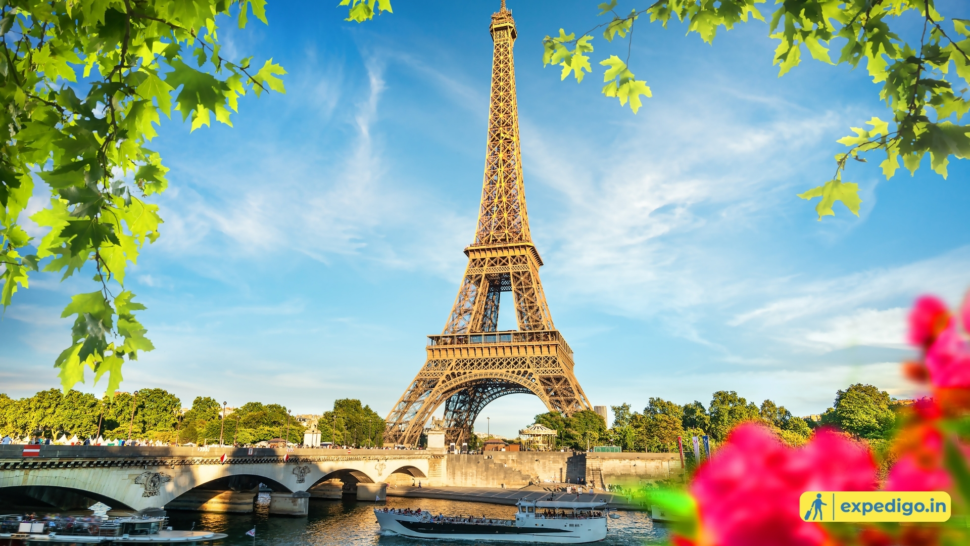 The Eiffel Tower illuminated at night in Paris, France—the grand finale of our Europe vacation packages.